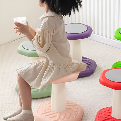 Balance children's plastic rocking stool in blue colour on a wooden floor.