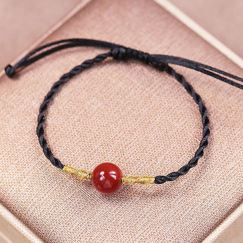 Hand-woven red agate bracelet and necklace set for women in national style with bead design.