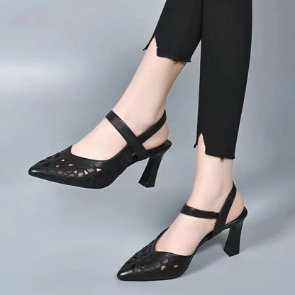 Red women's pointed toe backless sandals with a hollowed toe box and rubber sole
