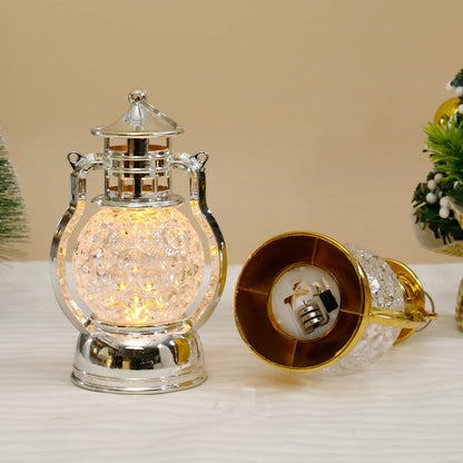 Small retro oil lamp design LED night light in gold or silver finish, 14.5cm tall.