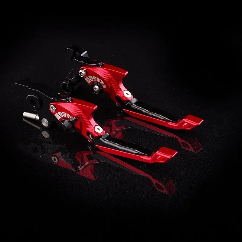 Pair of anodised metal bicycle brake horn handle levers with adjustable reach, shown in a two-tone colour finish.