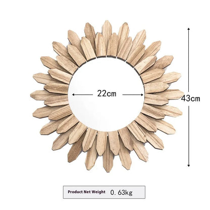 Round European-style solid wood hanging mirror with baked colour frame on a wall.