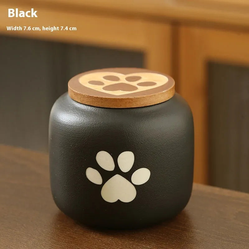 Ceramic pet funeral urn with foot print design in choice of colours and 180ml or 500ml sizes