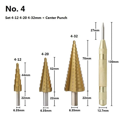 High-speed steel cone step drill bits and a centre punch laid out on a workbench.