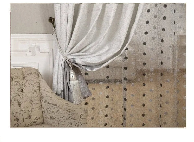 A single blackout curtain panel hanging, demonstrating its dense, light-blocking fabric and neat drape.