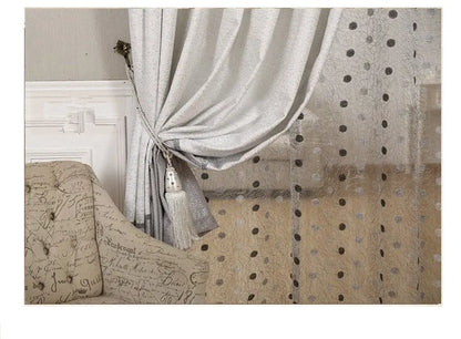 A single blackout curtain panel hanging, demonstrating its dense, light-blocking fabric and neat drape.