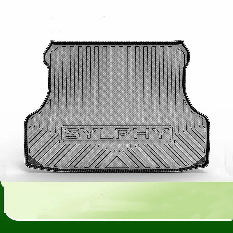 Black carbon fibre pattern tailored car boot liner mat fitted in an estate vehicle