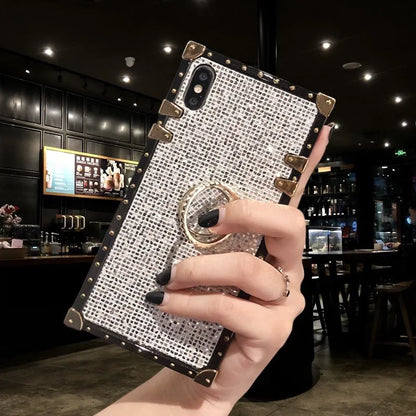 Square TPU mobile phone case in silver colour with a visible flash diamond bracket on the back
