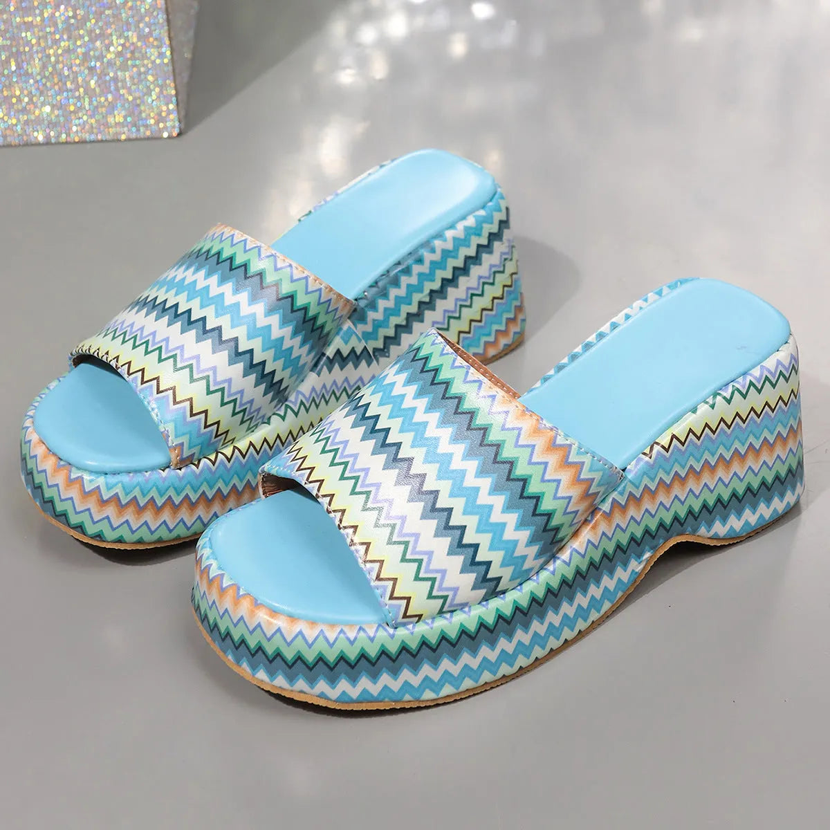 Women's beige wedges sandals with blue wave print, thick rubber sole, and fish mouth toe