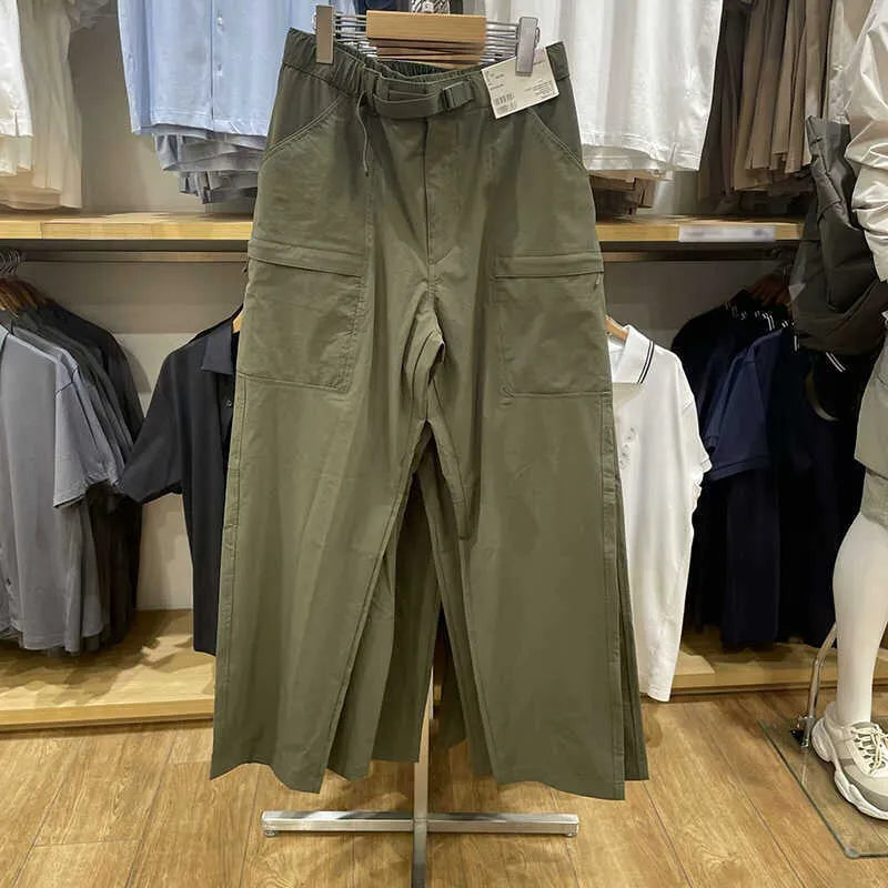 Men's straight leg work trousers in bamboo fibre fabric with micro elasticity stretch available in black, olive, and beige colours.