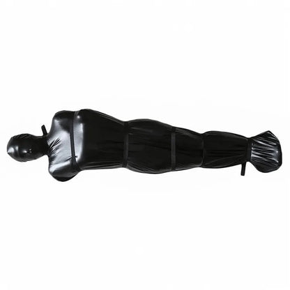Black patent leather bondage harness set with six ratchet tie-down straps arranged for display