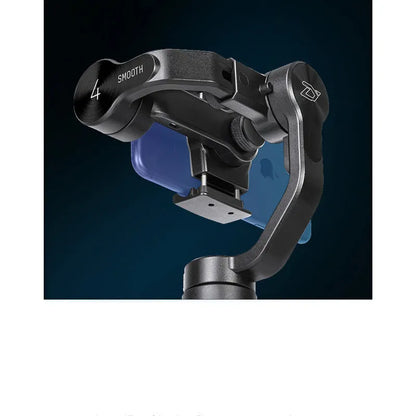 Black mobile phone handheld stabiliser gimbal on table with smartphone mounted