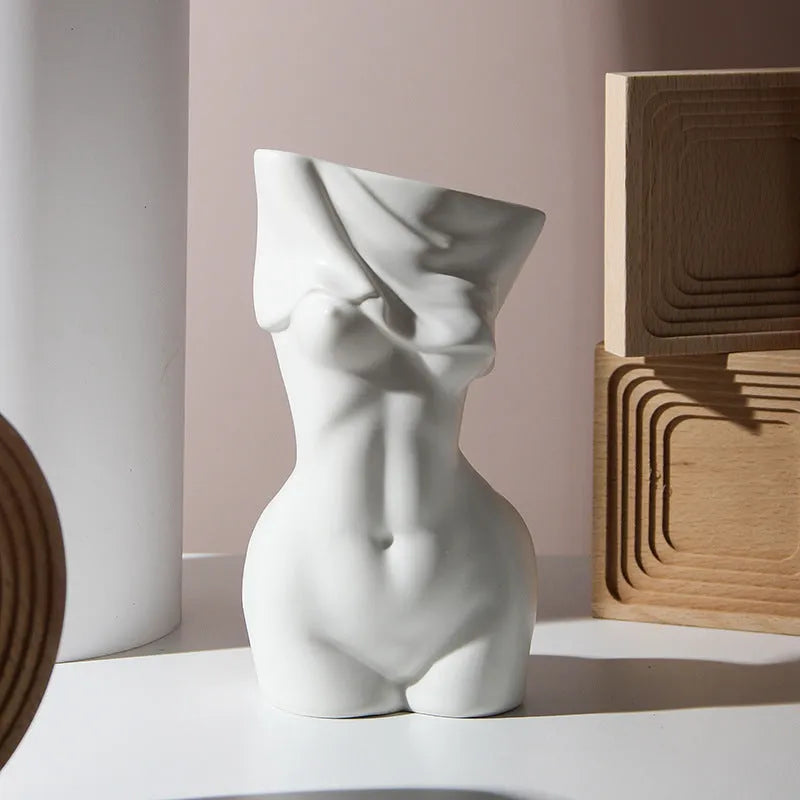Human body shape ceramic vase with colour glazed finish in sculptural form