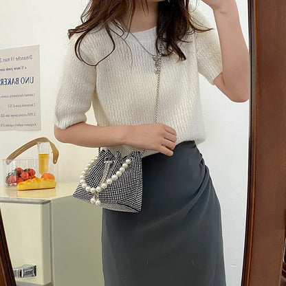 Diamond-patterned soft PU shoulder bag with detachable chain strap in bucket shape with internal organisers