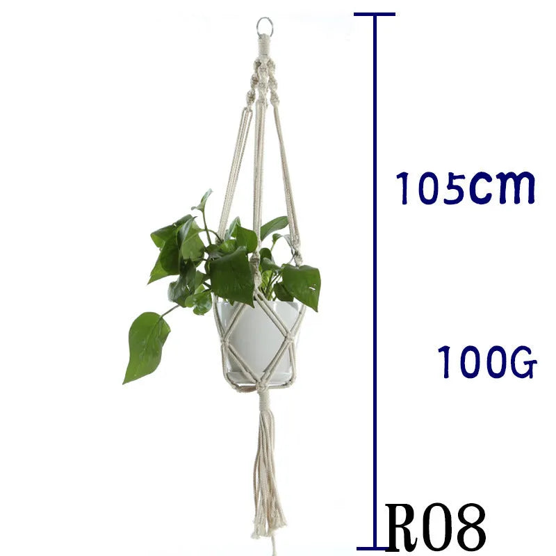 Handmade beige cotton rope net bag holding a plant pot, showing its textured sling design.