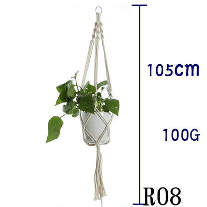 Handmade beige cotton rope net bag holding a plant pot, showing its textured sling design.