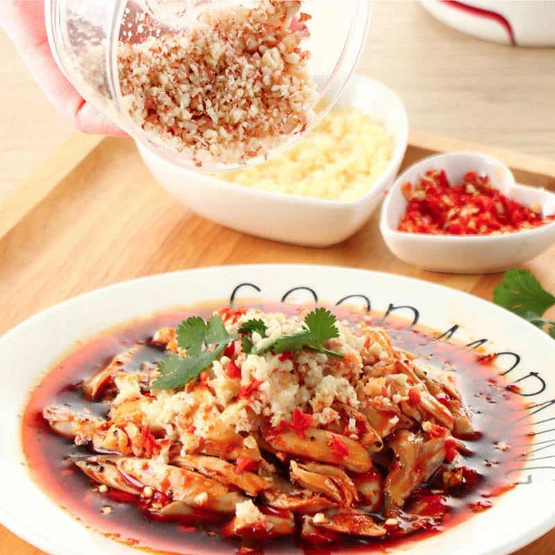 A versatile manual food chopper with self-locking blade mechanism, suitable for chopping a variety of ingredients in the kitchen.