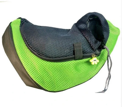 A comfortable and stylish pet sling bag with padded mesh and leather details, allowing hands-free travel for pet owners.