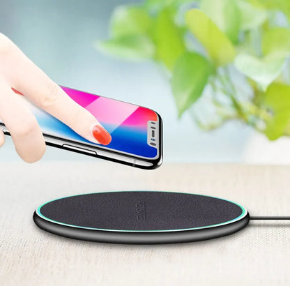 Black Quick Qi Wireless Charger for iPhone 11 showing 10 cm circular charging pad