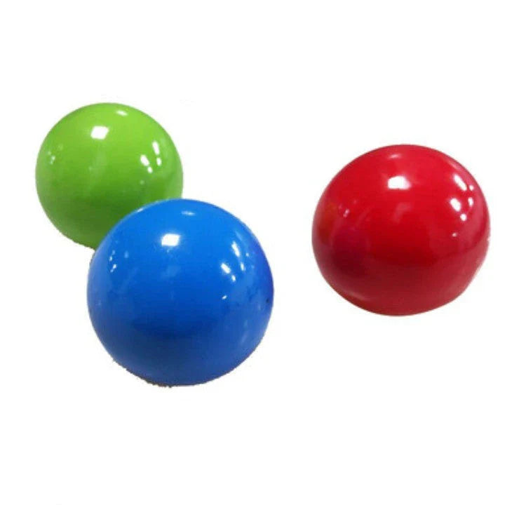 Colorful, luminous stress relief balls with a sticky surface for bouncing, squeezing, and sticking to surfaces