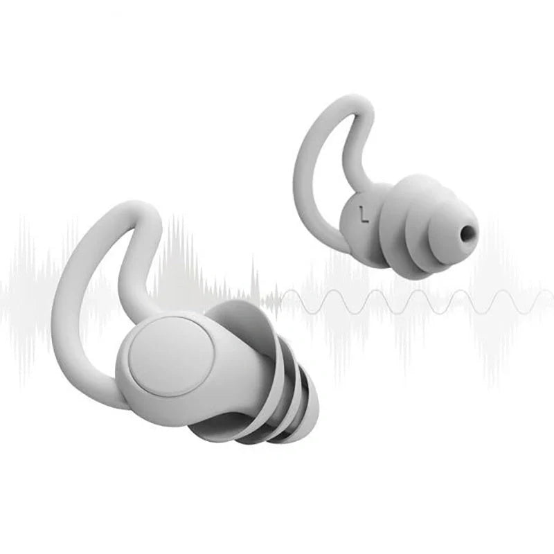 Soft, flexible silicone earplugs in grey and black colours, designed to block out disruptive sounds for a peaceful night's sleep