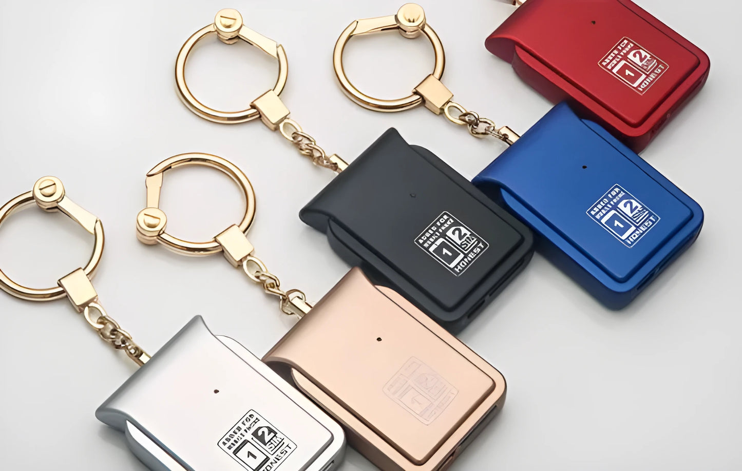 Black leather Bluetooth Dual SIM Adapter keychain with Nano SIM slot and Micro USB port.