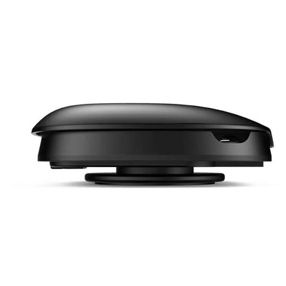 Black plastic rotating suction cup car navigator bracket mounted on a car windscreen