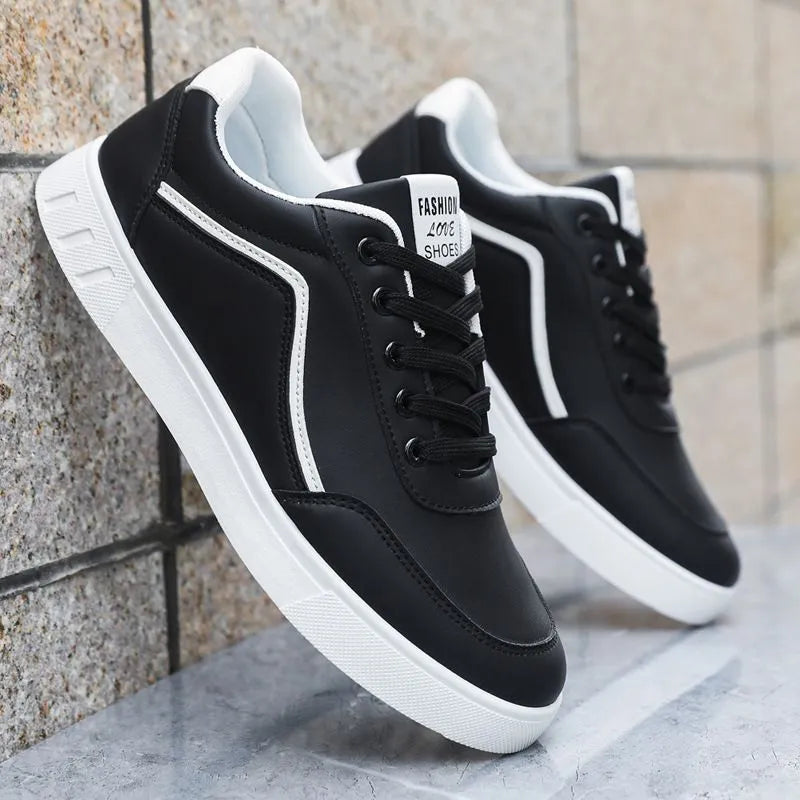Korean trendy wild sneakers in black and white, low-top design with mesh lining and rubber sole.