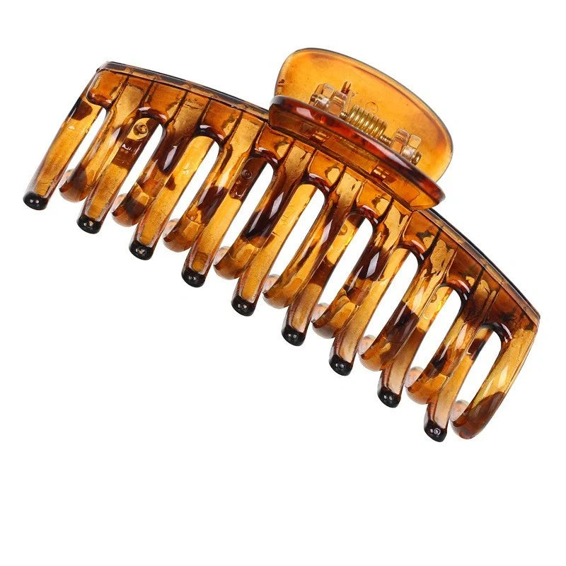 Candy-coloured ponytail clip hair accessory in assorted colours