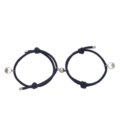 Magnetic couple's bracelet with geometric design and meaningful charms inspired by ancient Chinese tradition