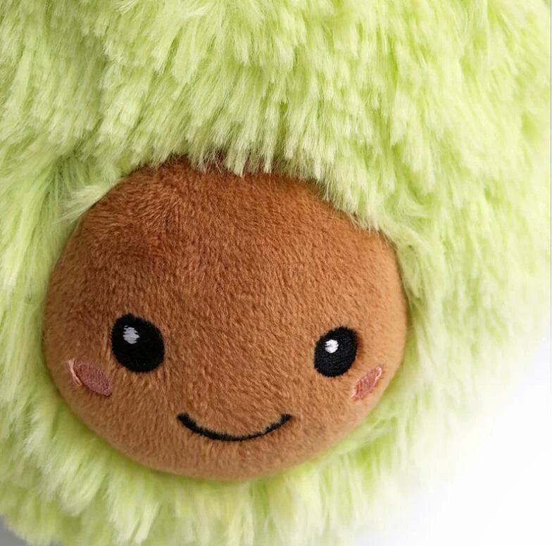 Cosy and plush avocado-shaped cushion in various sizes, providing soft comfort and relaxation for the home