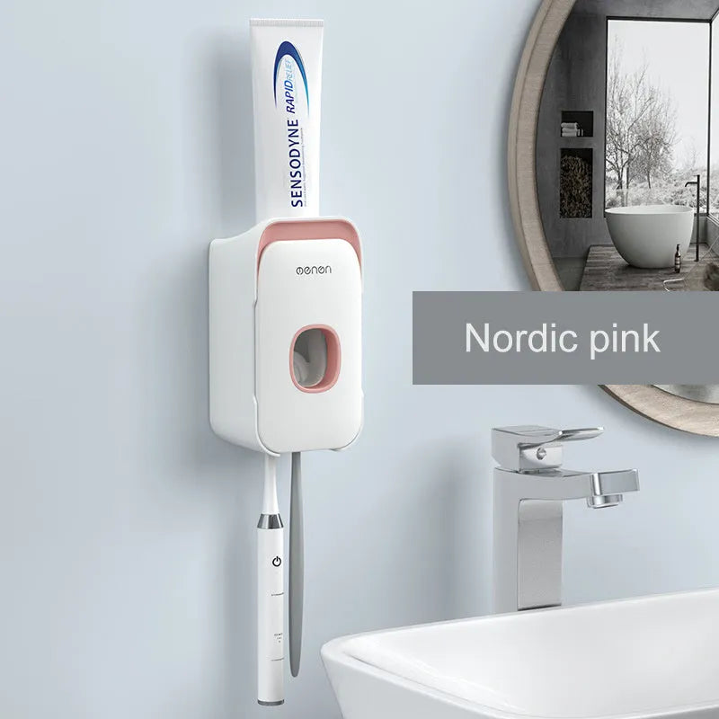 Automatic wall-mounted toothpaste dispenser in blue, grey, and pink colours with LED touch sensor.