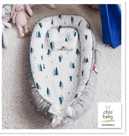 Cotton baby travel crib with removable washable cover in various cartoon designs
