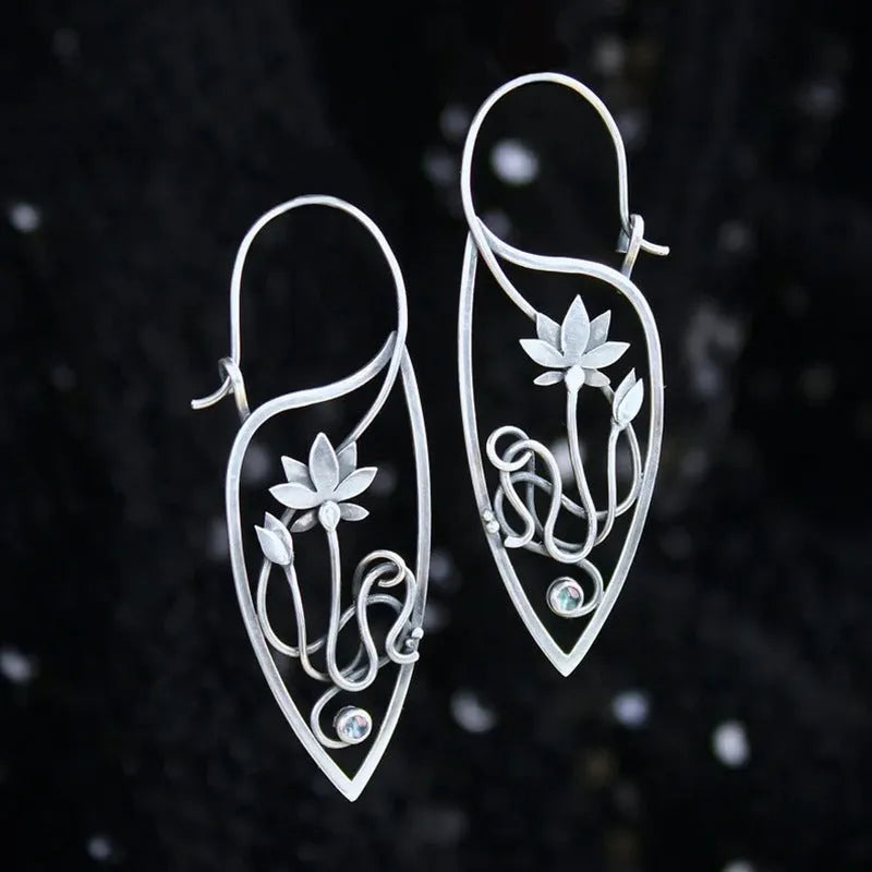 Silver lotus vine design women's earrings with geometric rhinestone details on electroplated alloy