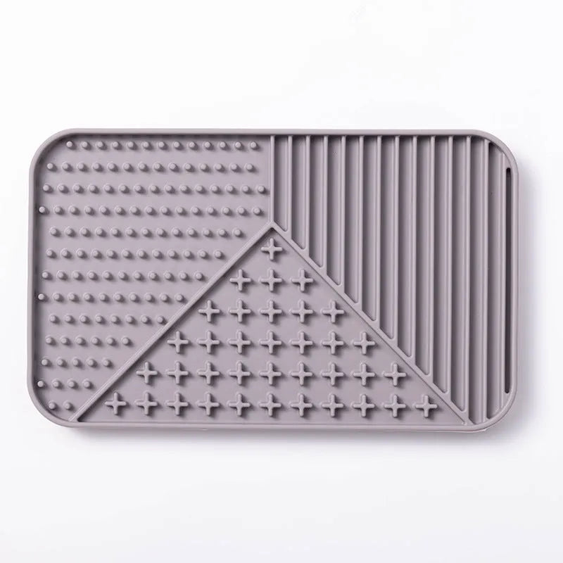 Silicone pet licking mat with suction cup base in pink, grey, or khaki colour options