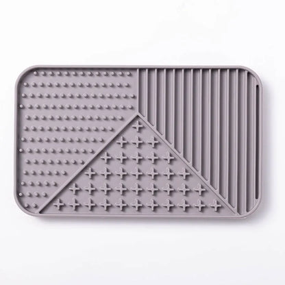Silicone pet licking mat with suction cup base in pink, grey, or khaki colour options