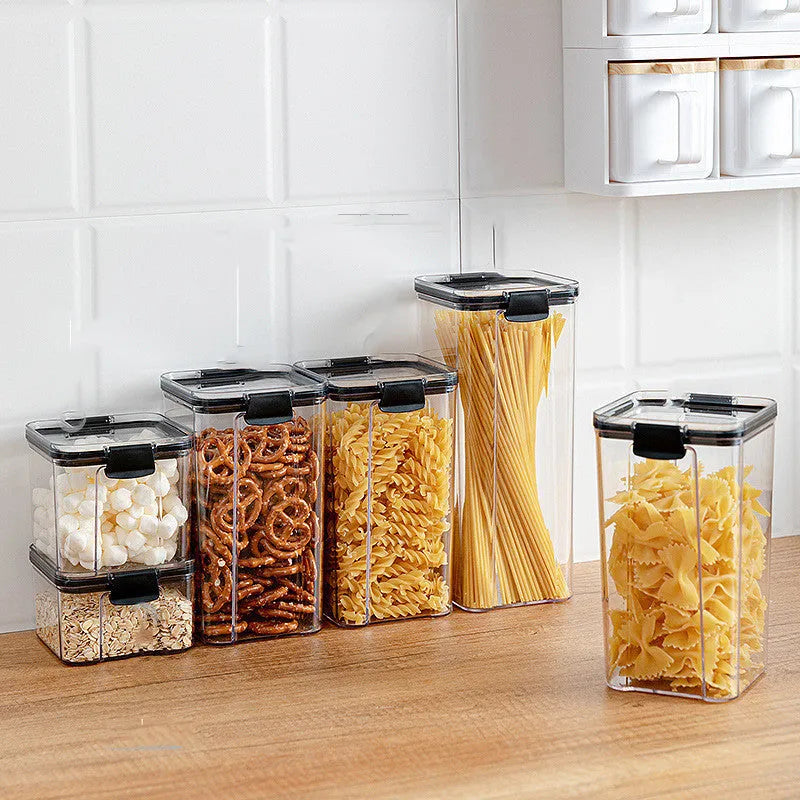 Transparent grain storage box with black lid, square-shaped PET containers in four capacity options: 1800ml, 1300ml, 700ml, and 460ml for modern kitchen pantry organisation