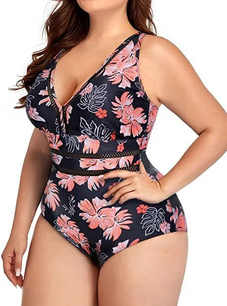 Black plus size bikini swimsuit with print design for women, shown on a hanger.