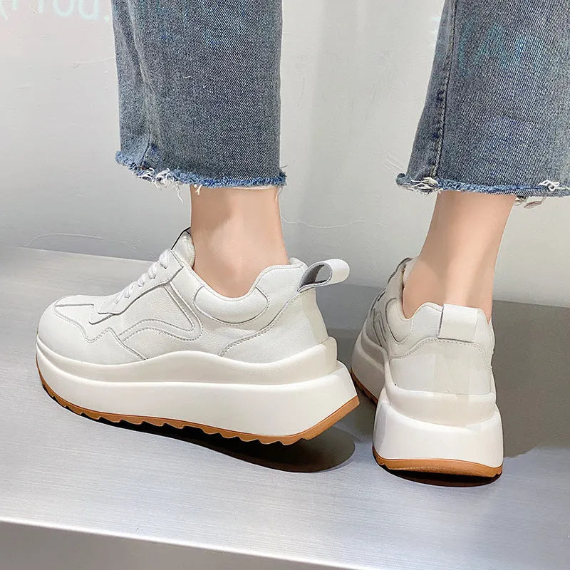Beige women's low-top casual sports shoes made from cattlehide leather with round toe and front lace-up.