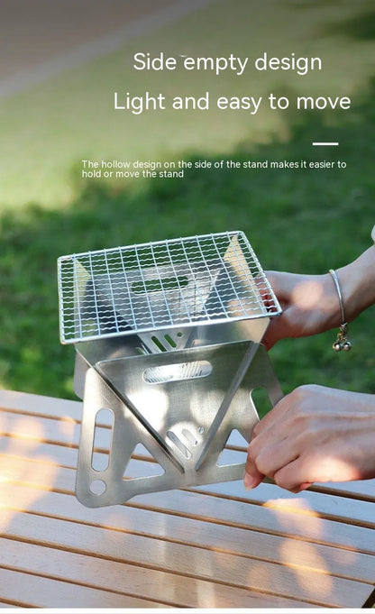 Folding stainless steel barbecue oven and grill with storage bag, shown in a large size for outdoor use.