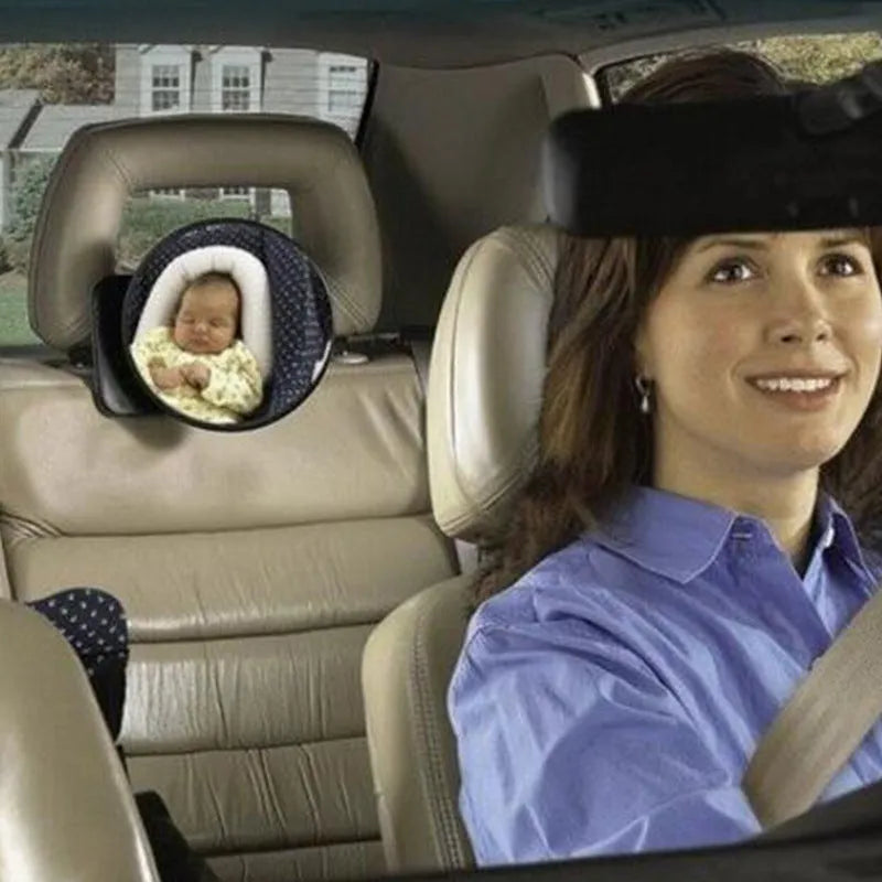 Black ABS baby safety rearview mirror with 17cm glass and adjustable strap for car headrest.