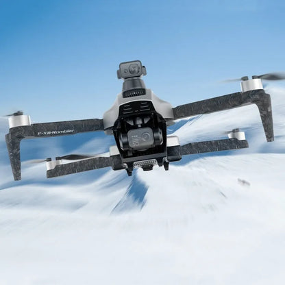 White folding quadcopter drone with camera and obstacle avoidance sensors, remote control, and shoulder bag.