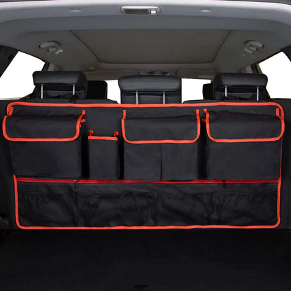 Black car hanging storage bag made of waterproof Oxford cloth with a handle, shown hanging in a vehicle boot.