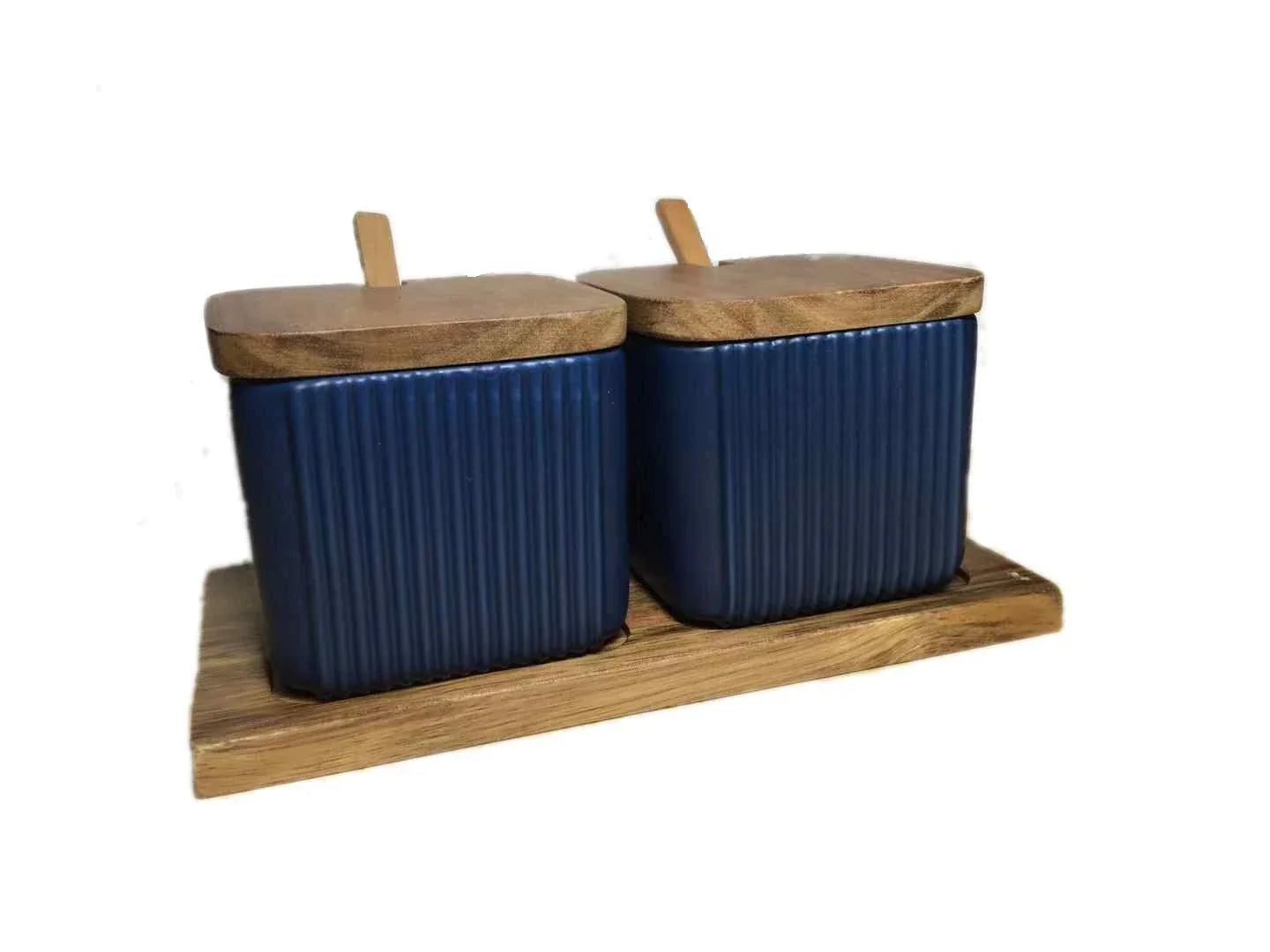 Stylish ceramic seasoning jars in a modern kitchen setting, featuring a matte glaze finish and a variety of color options.
