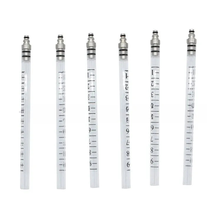 Brass and plastic fuel injection flow meter for oil return measurement, 37.5cm long.