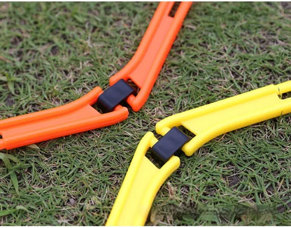 Set of six foldable hexagon football training rings in yellow, green and orange colours