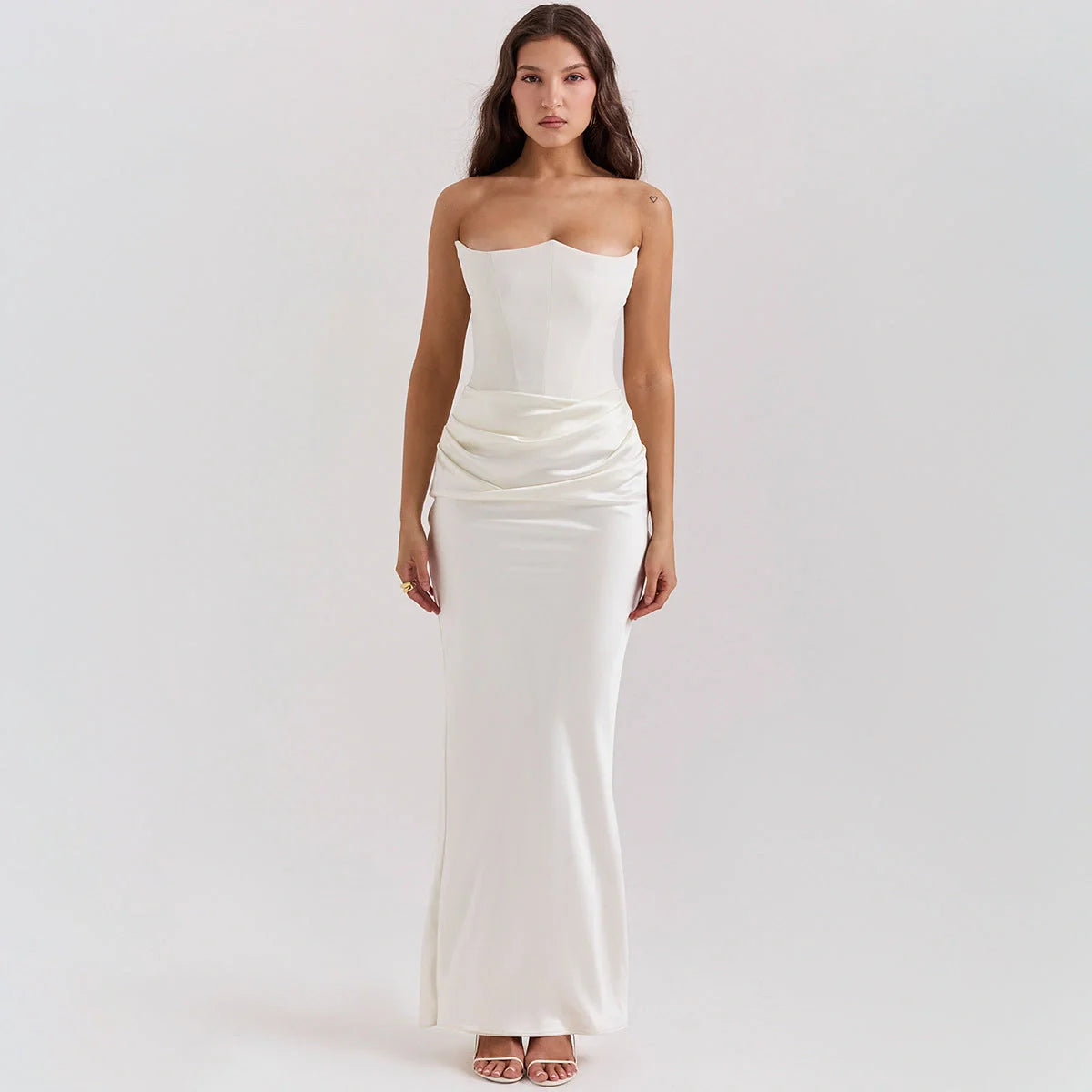 Elegant backless party dress in various colors and sizes, featuring a sleek and slender silhouette for the discerning UK fashionista