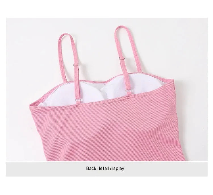 Women's long sleeve one-piece swimsuit in polyester fabric available in pink or black colours