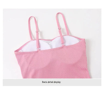 Women's long sleeve one-piece swimsuit in polyester fabric available in pink or black colours