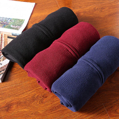 Men's autumn knitted jumper with round neck and long sleeves, shown in black, blue, and red colour options.